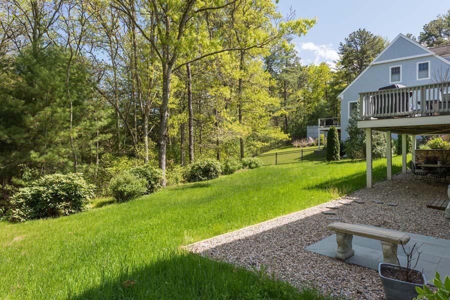 6 Wading Place Road Mashpee, MA 02649 - Photo 5 of 35 a view of a house with a yard