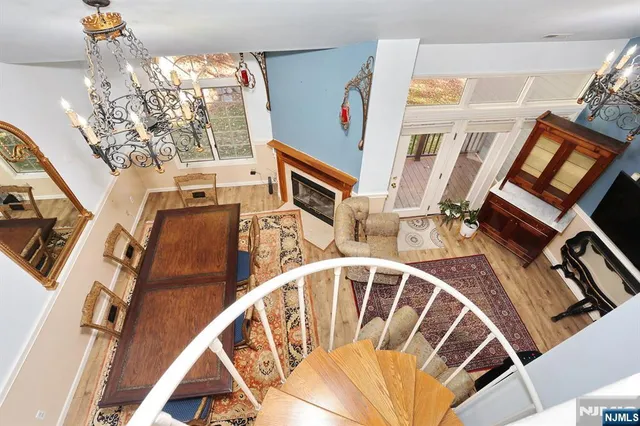 a view of a bedroom with washer and dryer