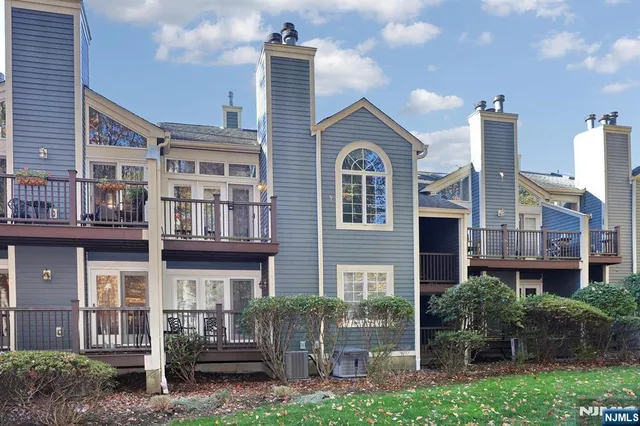 an aerial view of residential house with outdoor space