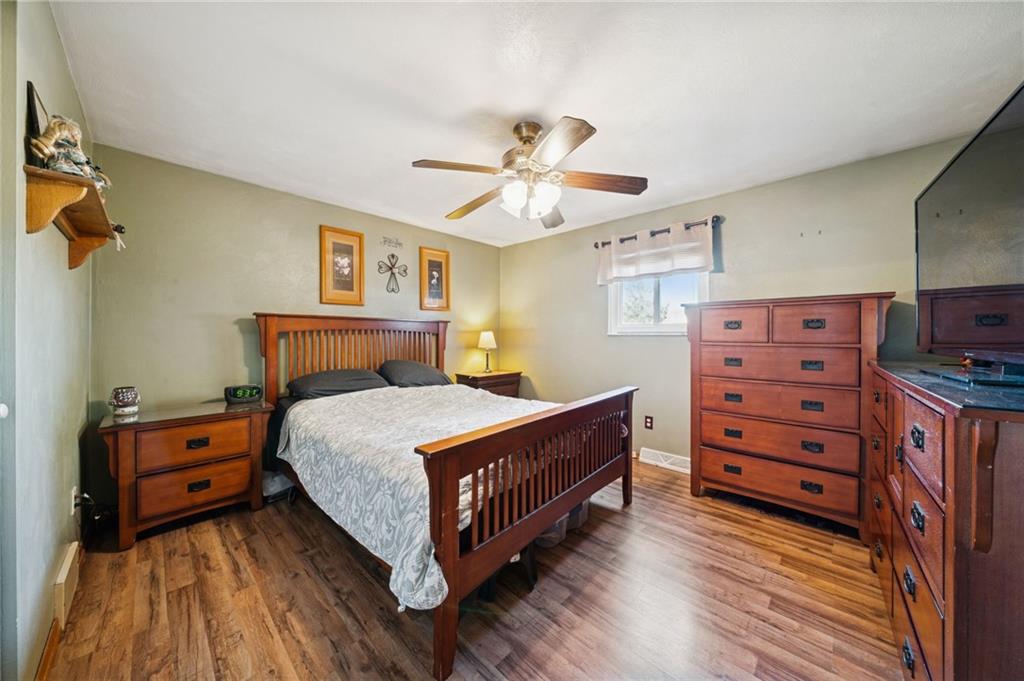 588 Carmelott Street Irwin, PA 15642 - Photo 13 of 33 a bedroom with a bed and furniture