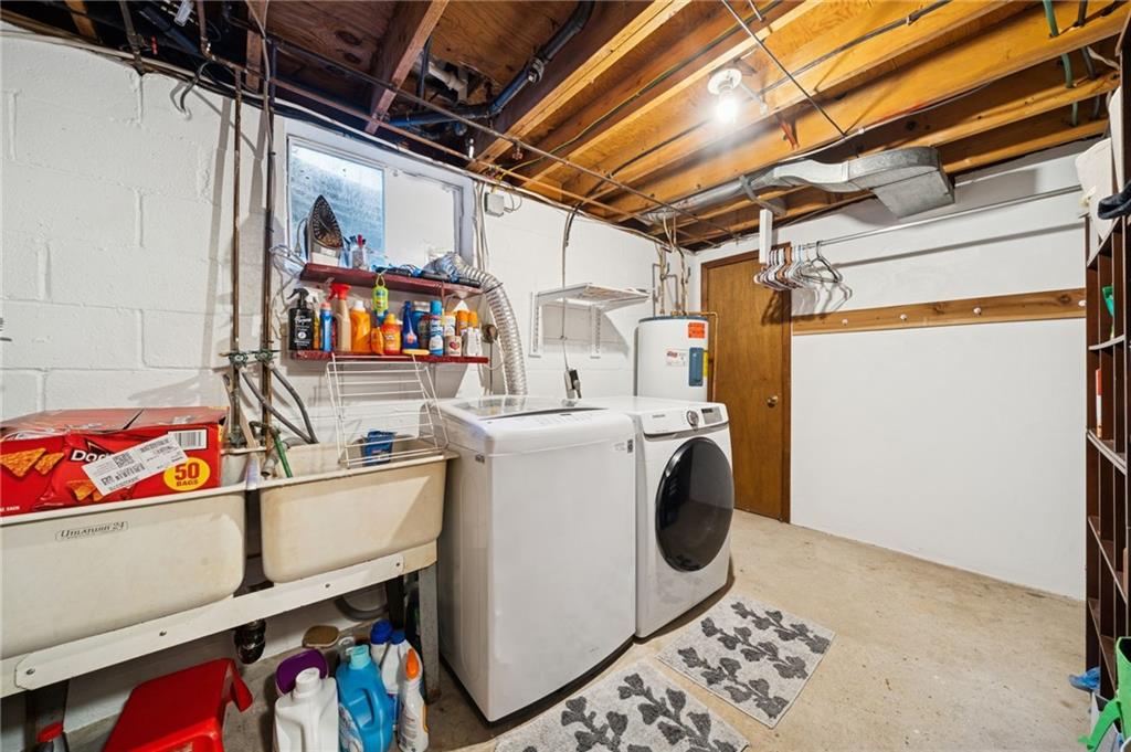 588 Carmelott Street Irwin, PA 15642 - Photo 19 of 33 a utility room with dryer and washer