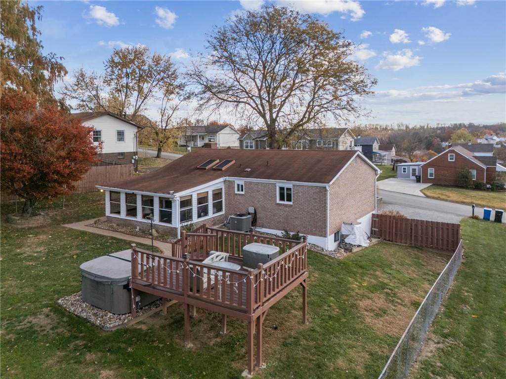 588 Carmelott Street Irwin, PA 15642 - Photo 3 of 33 a front view of a house with garden and trees