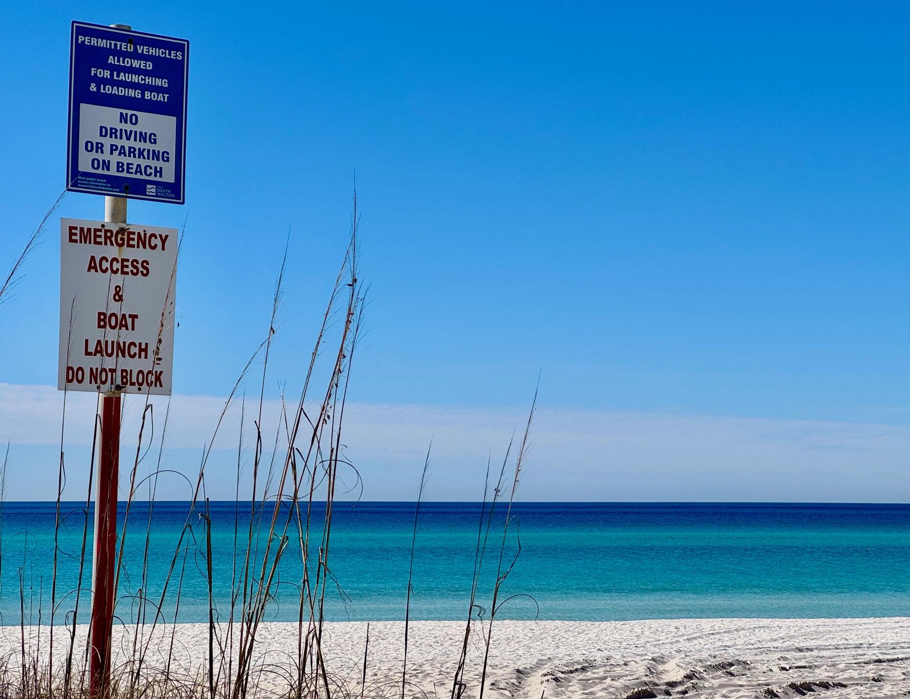 228 Walton Magnolia Lane, Unit 9 Inlet Beach, FL 32461 - Photo 23 of 24 a view of a hall with an empty room