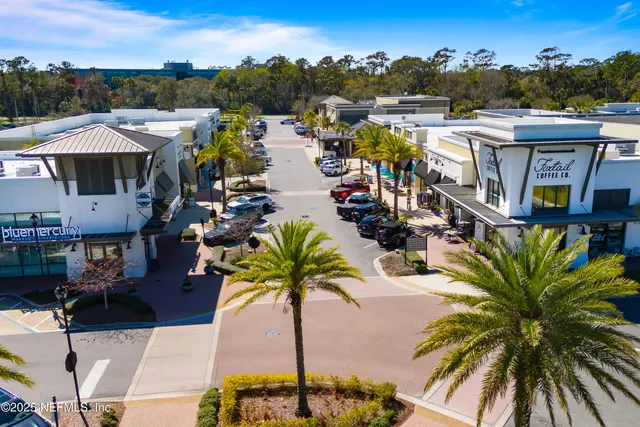 an aerial view of a pool patio swimming pool and outdoor seating
