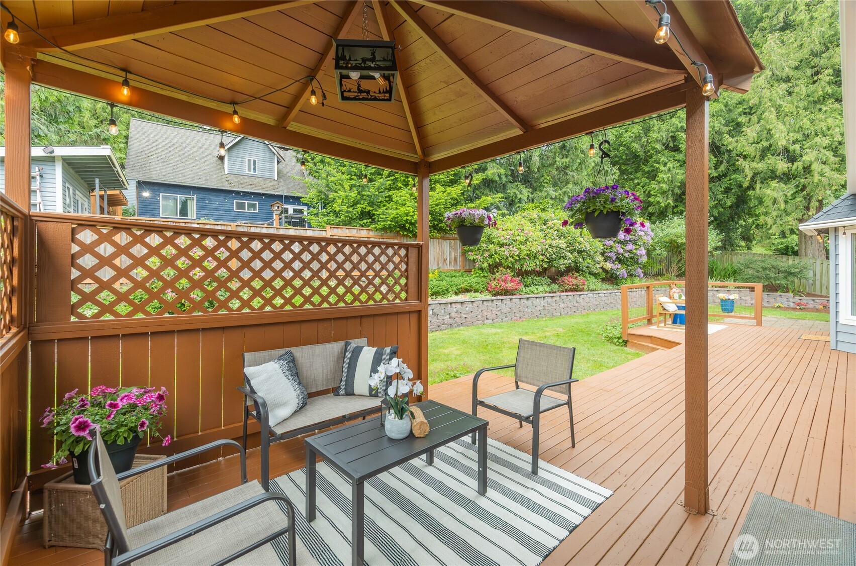 412 164th Place Southeast Bothell, WA 98012 - Photo 33 of 39 a view of a patio with a table chairs and a patio