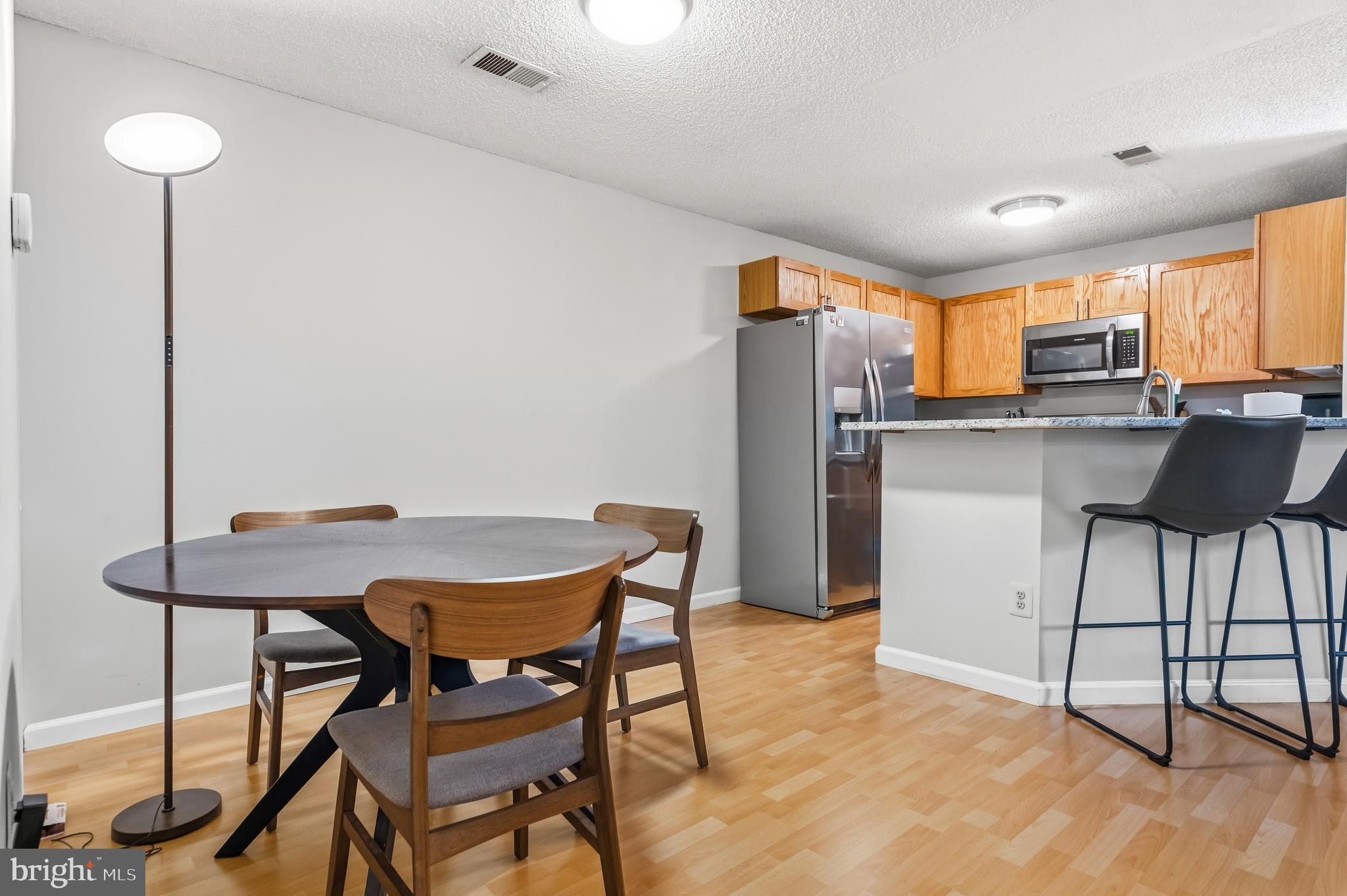11705 Summerchase Circle Reston, VA 20194 - Photo 18 of 25 Dining Room and Kitchen