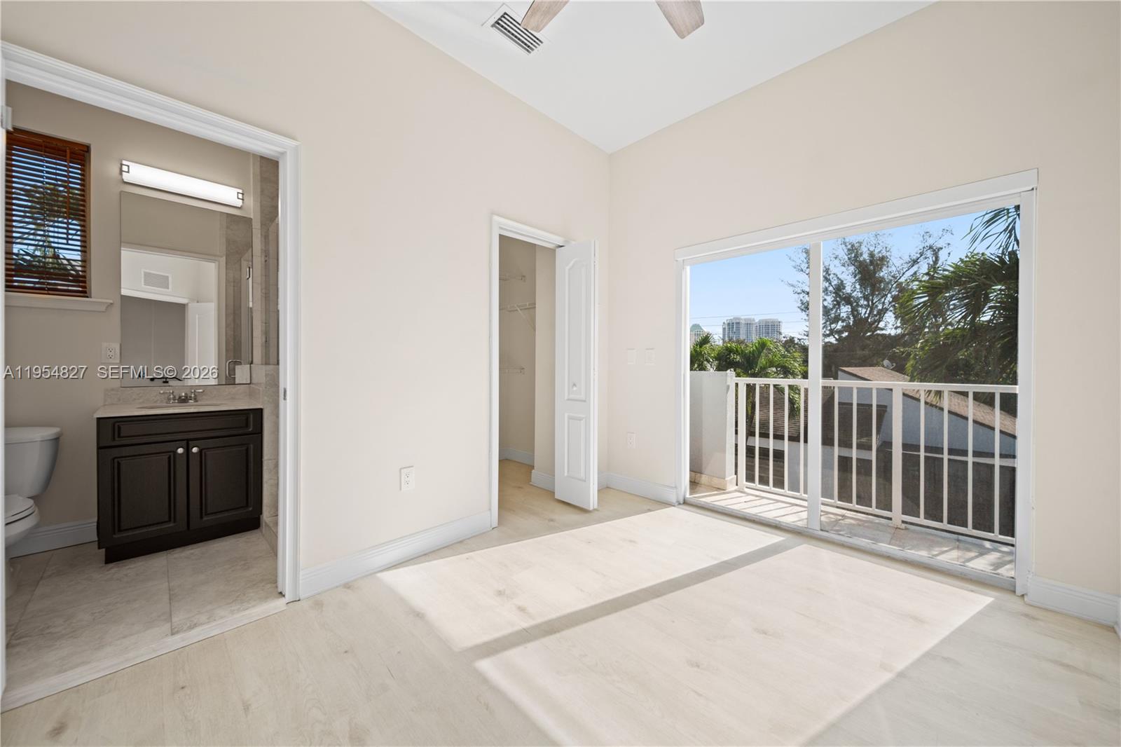 2951 Virginia Street, Unit 2953 Miami, FL 33133 - Photo 11 of 18 a view of a bedroom from a hallway
