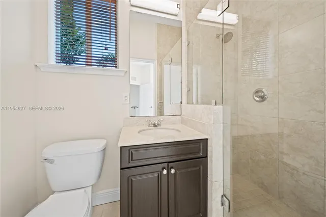 a bathroom with a sink and toilet