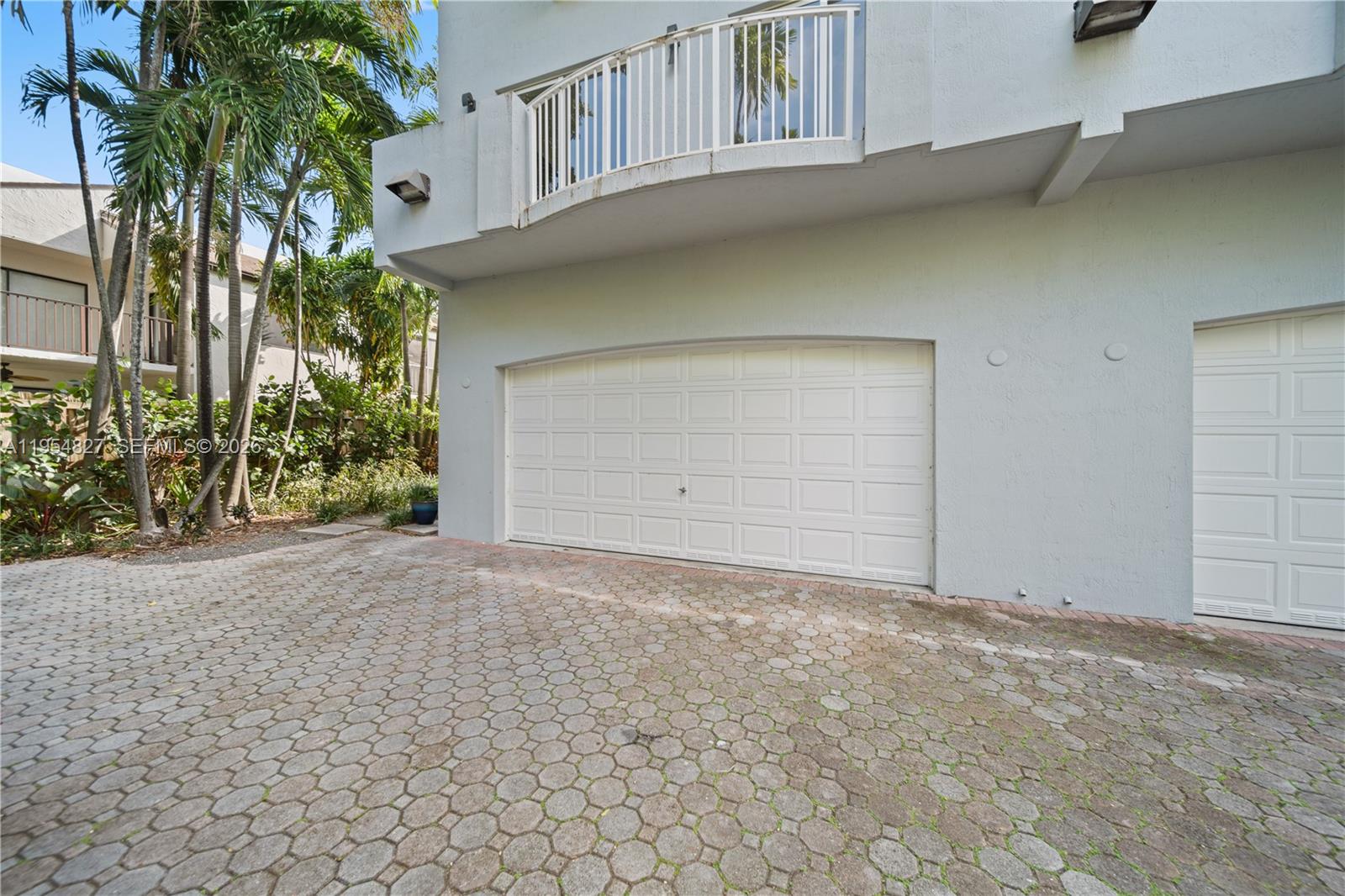 2951 Virginia Street, Unit 2953 Miami, FL 33133 - Photo 2 of 18 a view of a house with a tree