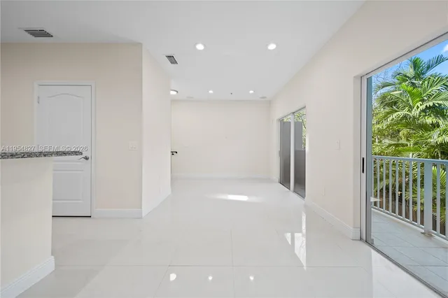 a bathroom with a toilet and a bathtub