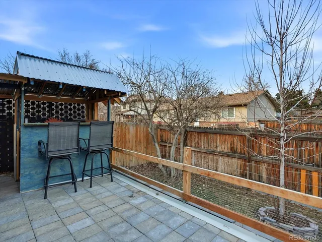 a room with lots of appliances and furniture