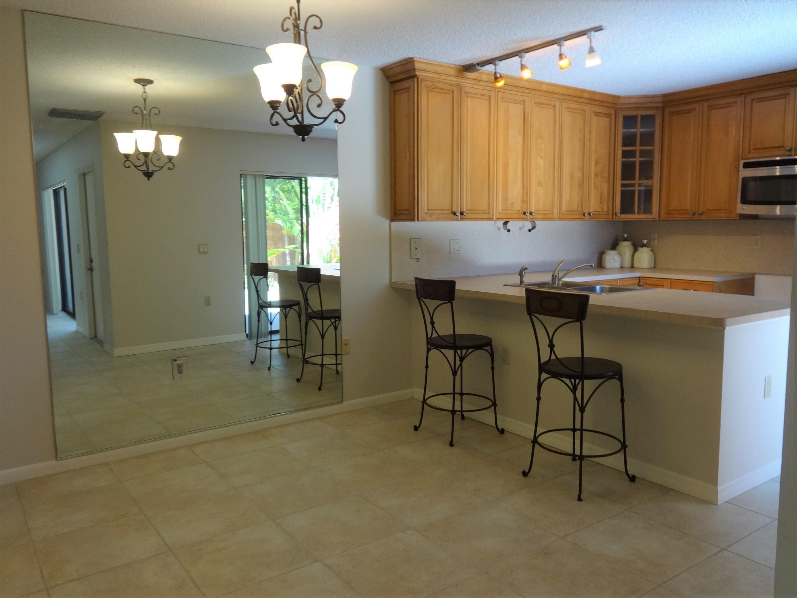 3203 32nd Court Jupiter, FL 33477 - Photo 5 of 27 Dining Room