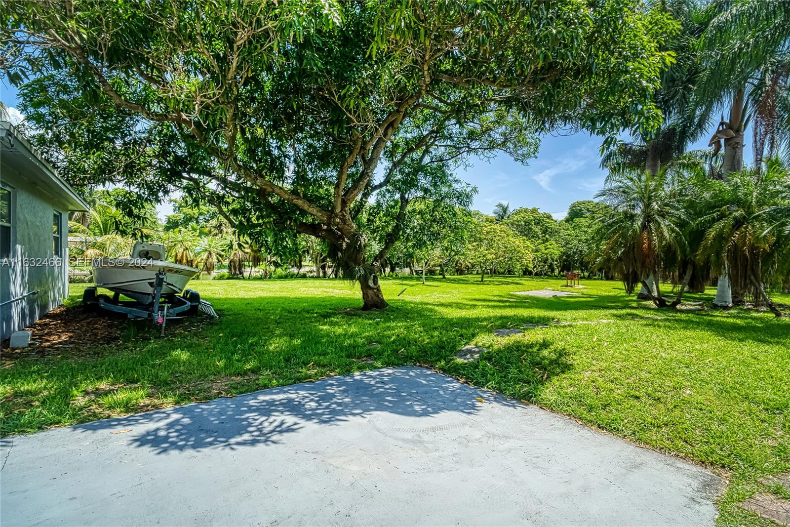 216 Southwest 6th Street Hallandale Beach, FL 33009 - Photo 42 of 70 a view of a park with trees and grass