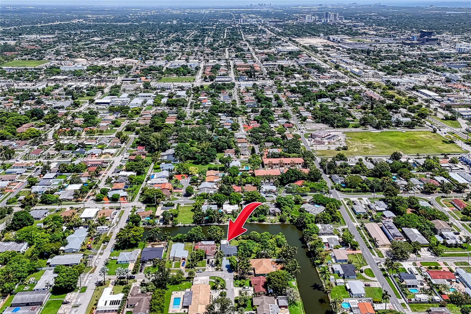 216 Southwest 6th Street Hallandale Beach, FL 33009 - Photo 54 of 70 an aerial view of residential houses with outdoor space and trees