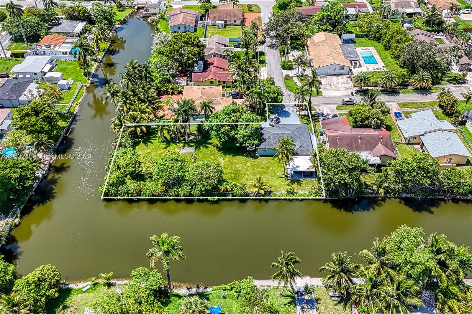 216 Southwest 6th Street Hallandale Beach, FL 33009 - Photo 63 of 70 an aerial view of residential houses with outdoor space and lake view