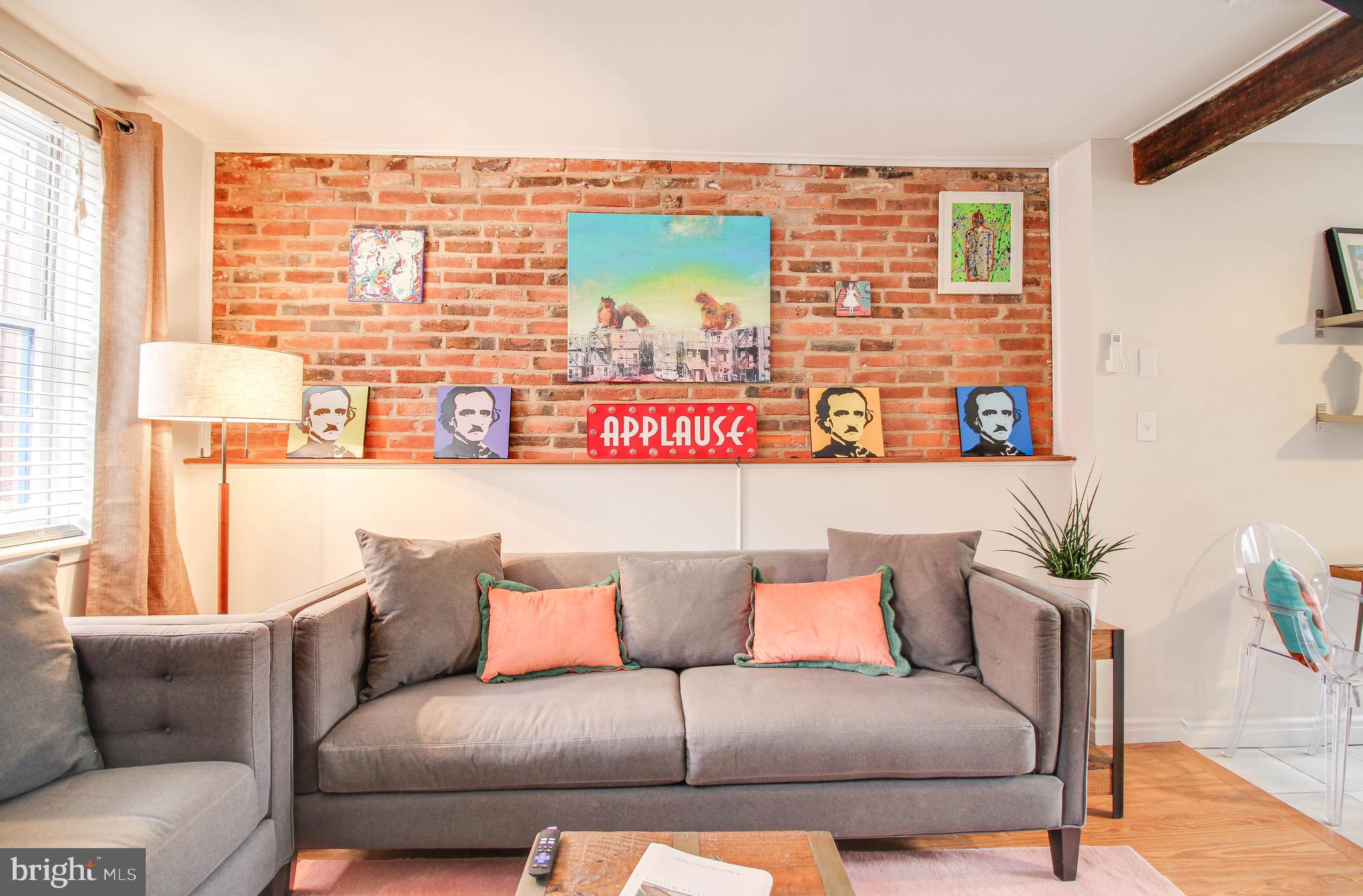 402 South Dallas Street Baltimore, MD 21231 - Photo 3 of 38 Brick accent wall