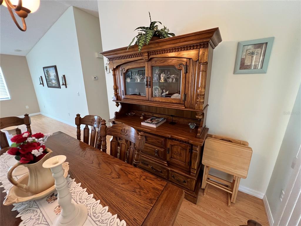 1232 Zapata Place Lady Lake, FL 32159 - Photo 6 of 10 a living room with furniture and a fireplace