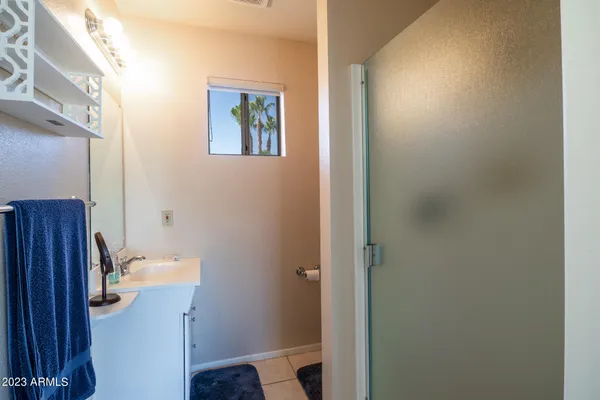 a bathroom with a sink and toilet