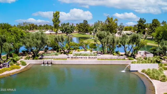 a view of a lake with a city