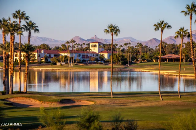 a view of swimming pool with outdoor seating