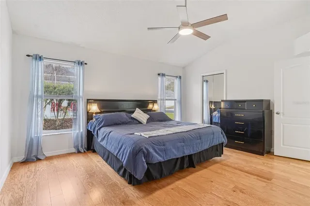 a bathroom with double sink and a mirror