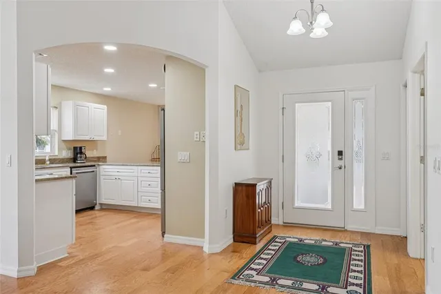 a view of a livingroom with furniture and wooden floor