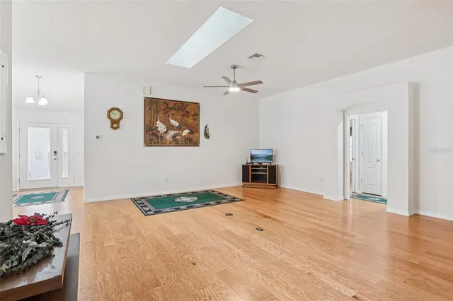a room with furniture and a wooden floor