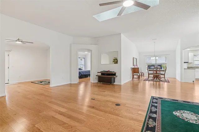 a kitchen with kitchen island granite countertop stainless steel appliances and sink