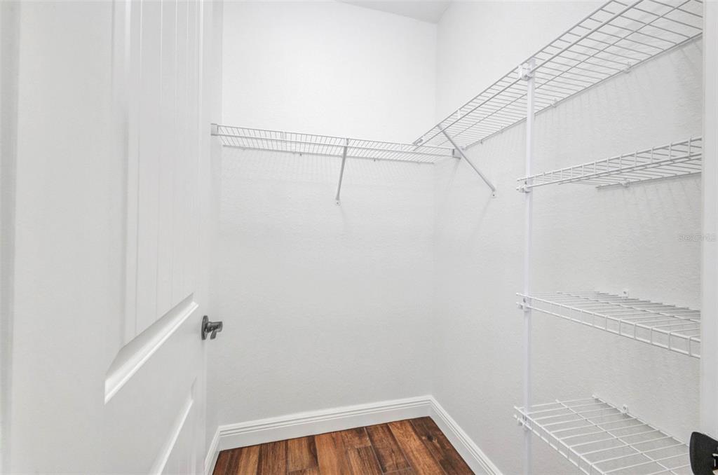 409 Carmalita Street, Unit 111 & 112 Punta Gorda, FL 33950 - Photo 51 of 75 a view of a room with racks on the wall