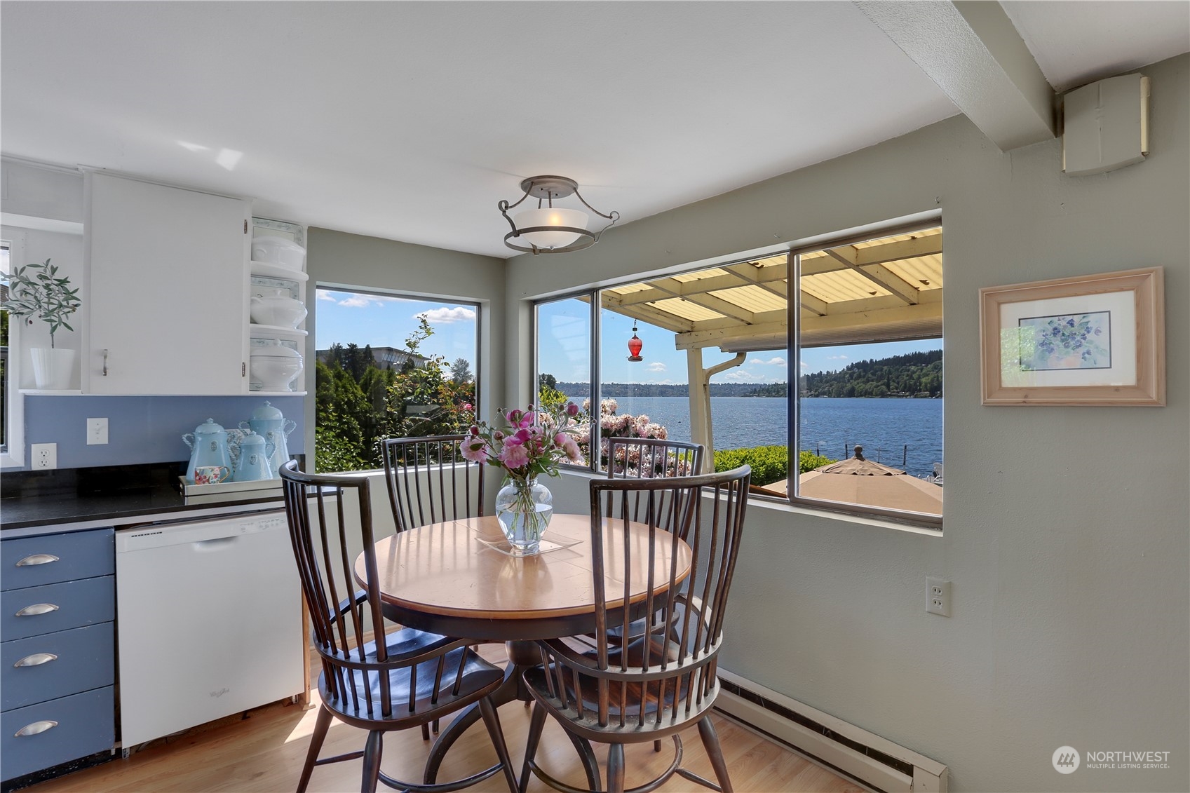 7005 Ripley Ln S East Renton, WA 98056 - Photo 16 of 35 a view of a dining room with furniture window and outside view