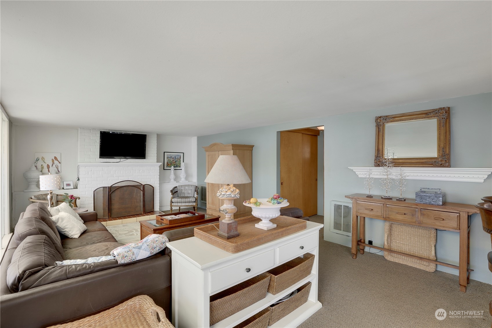 7005 Ripley Ln S East Renton, WA 98056 - Photo 18 of 35 a living room with furniture and a fireplace