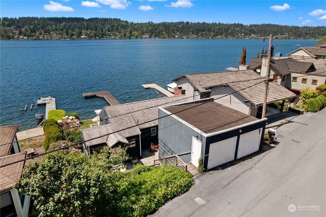 a room with a large window and a table