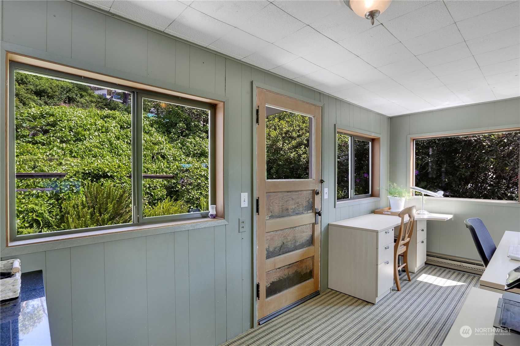 7005 Ripley Ln S East Renton, WA 98056 - Photo 10 of 35 a room with a large window and a table