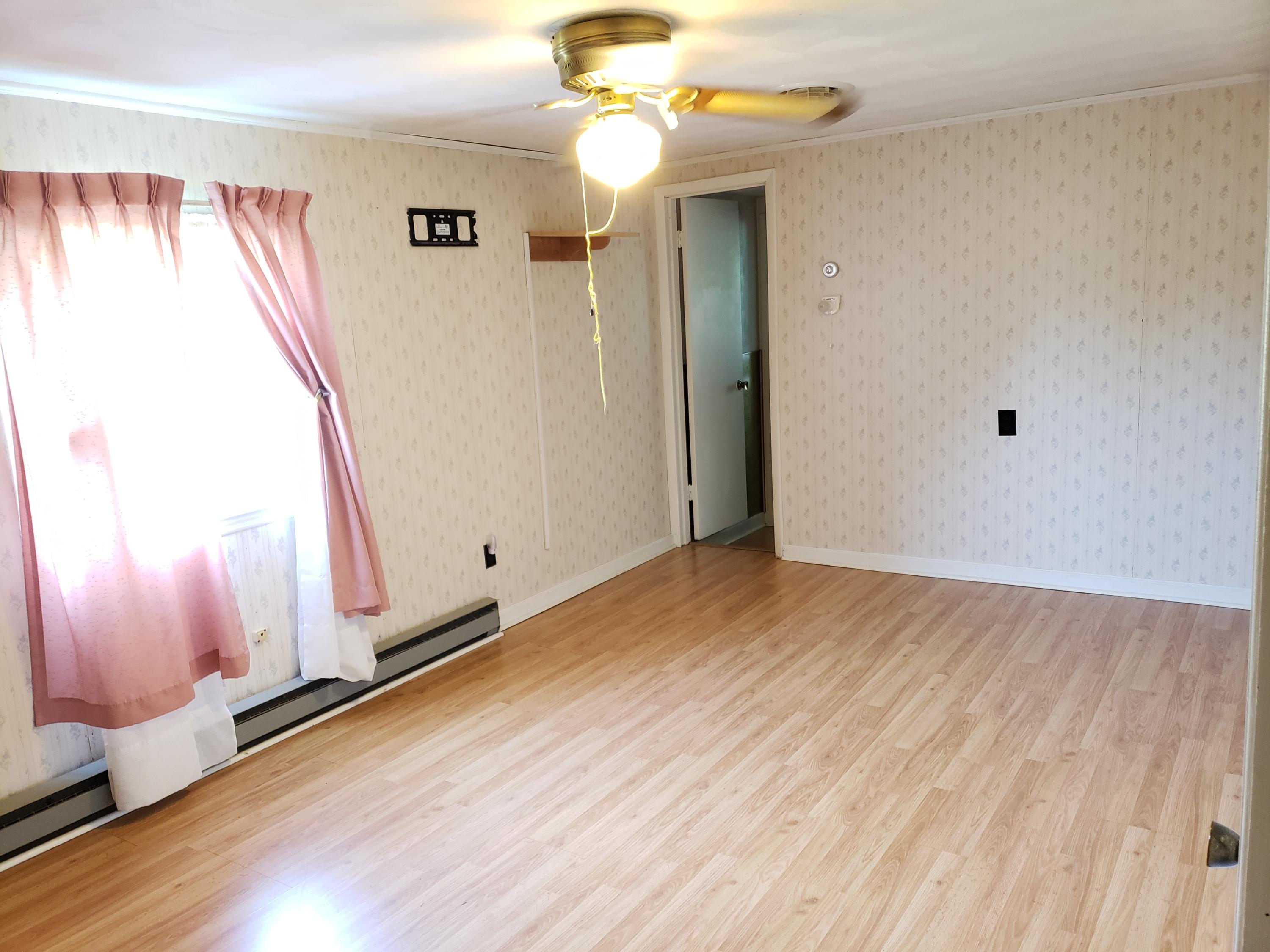 3529 Old Forge Road Rocky Mount, VA 24151 - Photo 5 of 14 a view of a livingroom with wooden floor