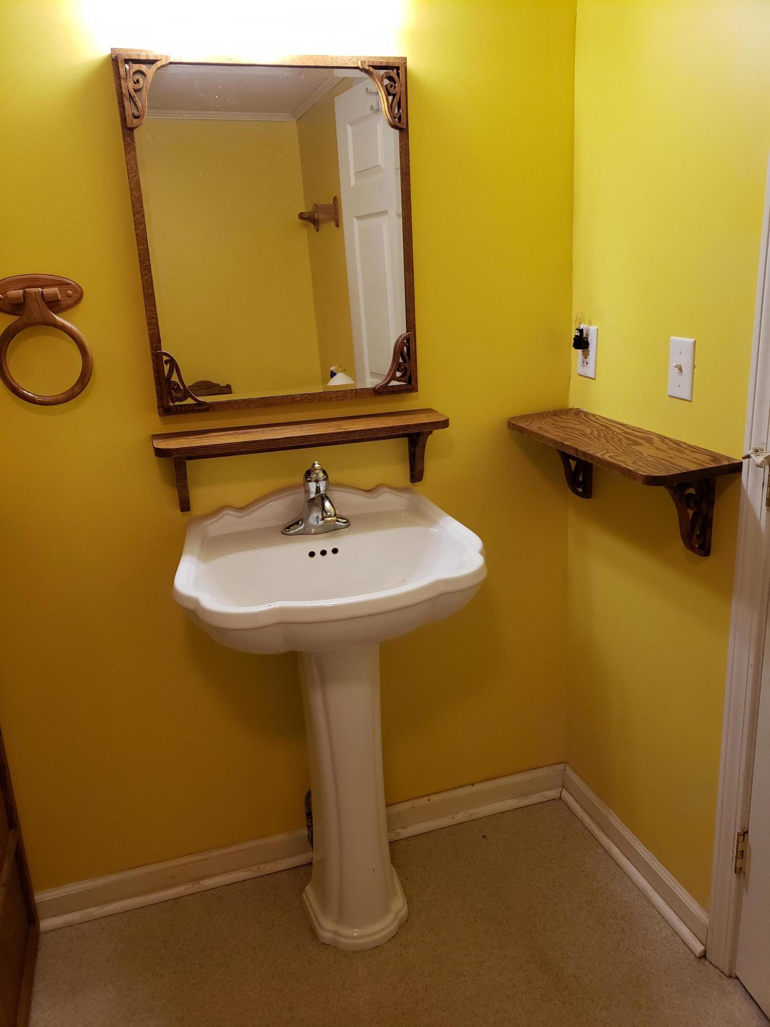 3529 Old Forge Road Rocky Mount, VA 24151 - Photo 9 of 14 a bathroom with a sink and a mirror