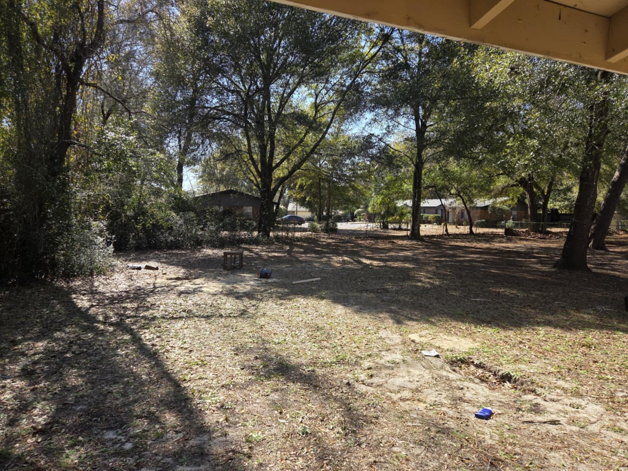 814 Cardinal Street, Unit A & B Fort Walton Beach, FL 32547 - Photo 4 of 4 a view of road covered with trees