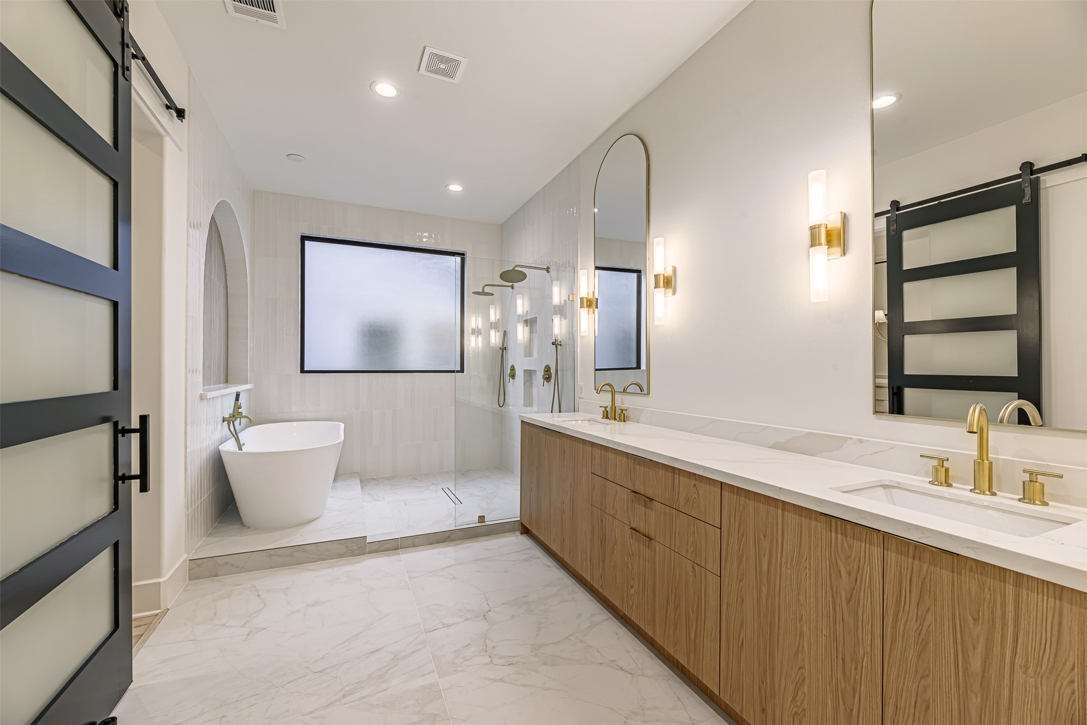 1104 West 9th Street Houston, TX 77007 - Photo 14 of 25 a bathroom with a double vanity sink mirror and toilet