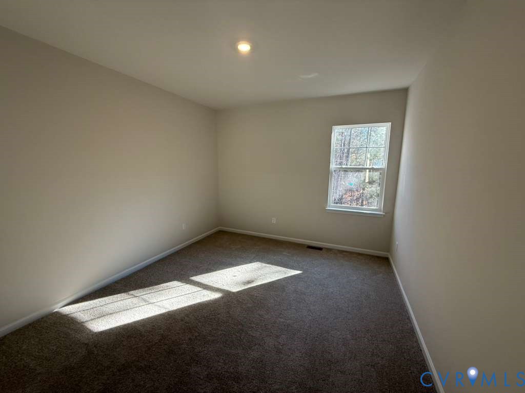 6473 Fennec Run Moseley, VA 23120 - Photo 15 of 16 Spare room with carpet floors and recessed lightin