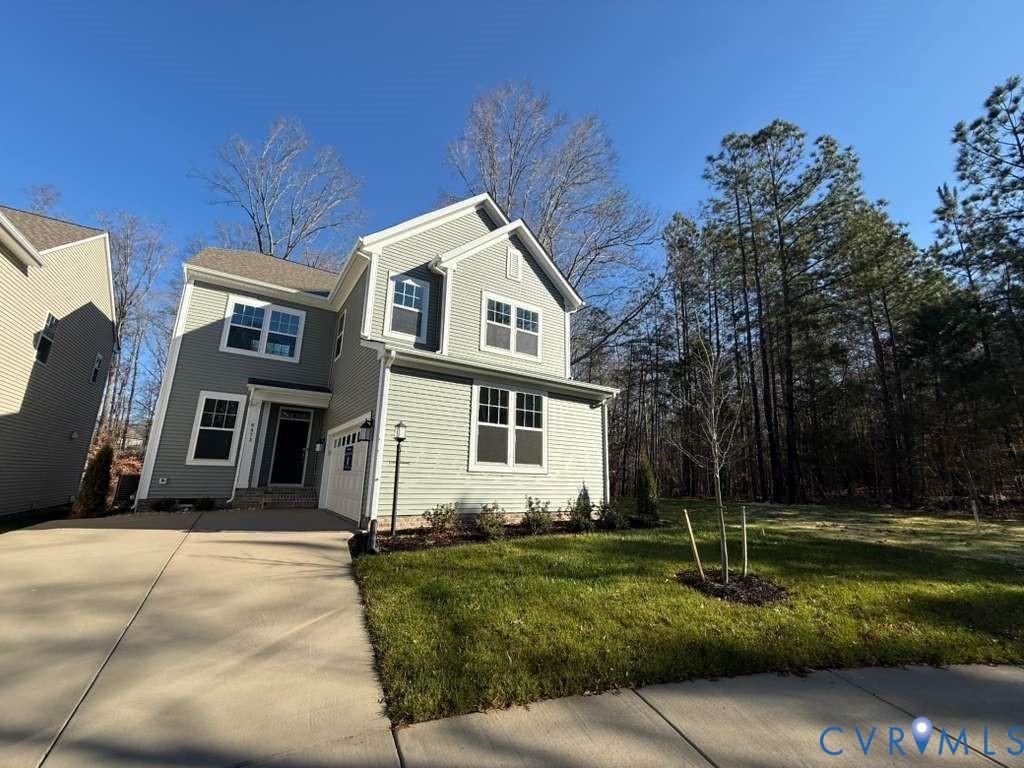 6473 Fennec Run Moseley, VA 23120 - Photo 2 of 16 Traditional-style house featuring driveway, a fron