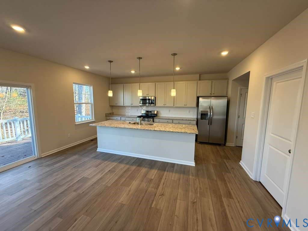6473 Fennec Run Moseley, VA 23120 - Photo 4 of 16 Kitchen featuring stainless steel appliances, an i