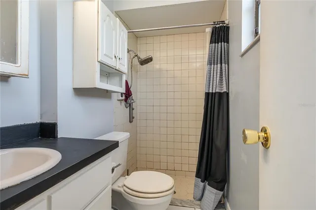 a bathroom with a sink and a toilet