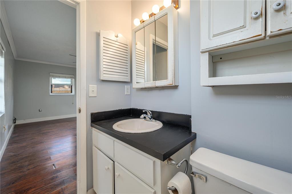 1330 Spring Court Bartow, FL 33830 - Photo 19 of 40 a bathroom with a sink and a toilet