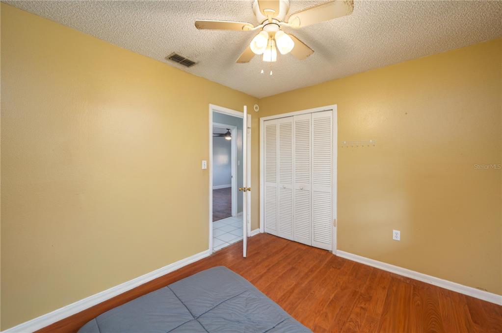 1330 Spring Court Bartow, FL 33830 - Photo 23 of 40 a view of room with window and ceiling fan
