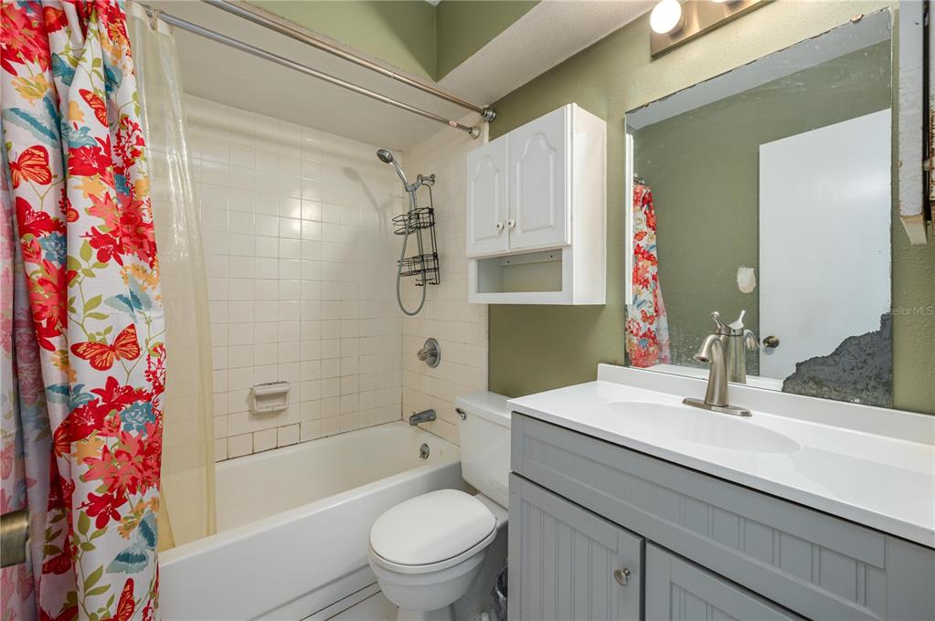 1330 Spring Court Bartow, FL 33830 - Photo 24 of 40 a bathroom with a sink a toilet and shower