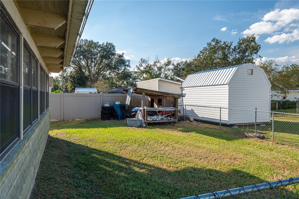 1330 Spring Court Bartow, FL 33830 - Photo 33 of 40 a view of a house with swimming pool and sitting area