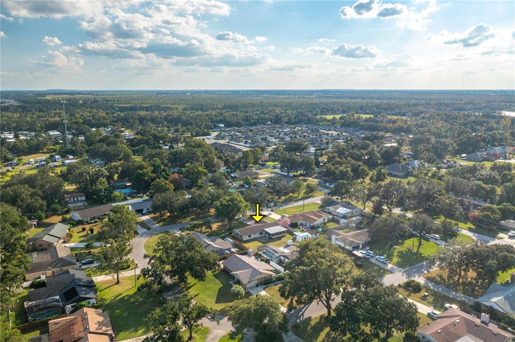 1330 Spring Court Bartow, FL 33830 - Photo 38 of 40 an aerial view of residential building with green space and street view