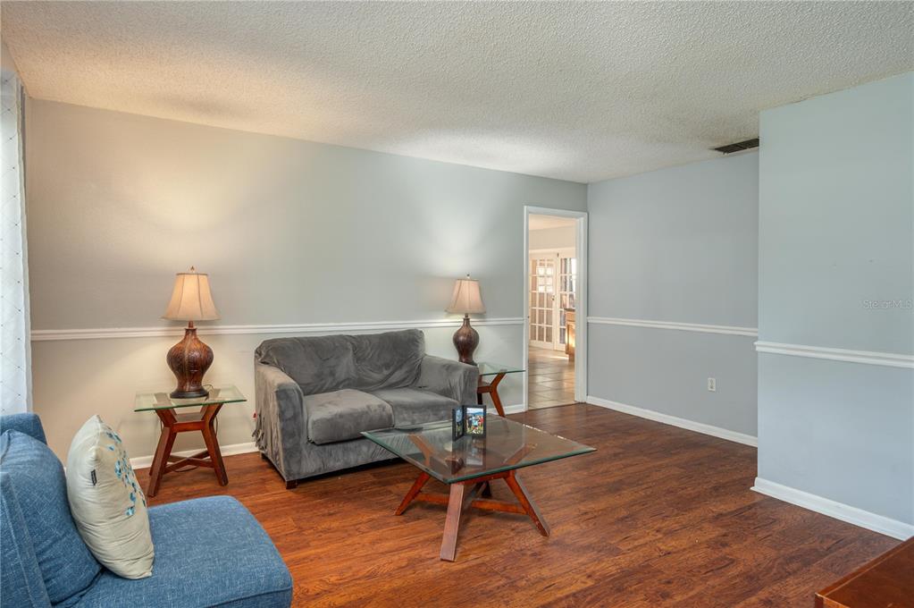 1330 Spring Court Bartow, FL 33830 - Photo 6 of 40 a living room with furniture and a rug