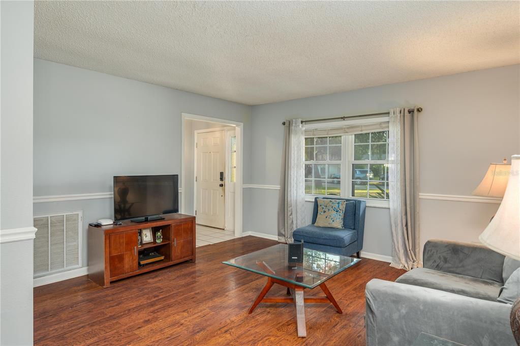 1330 Spring Court Bartow, FL 33830 - Photo 7 of 40 a living room with furniture and a flat screen tv