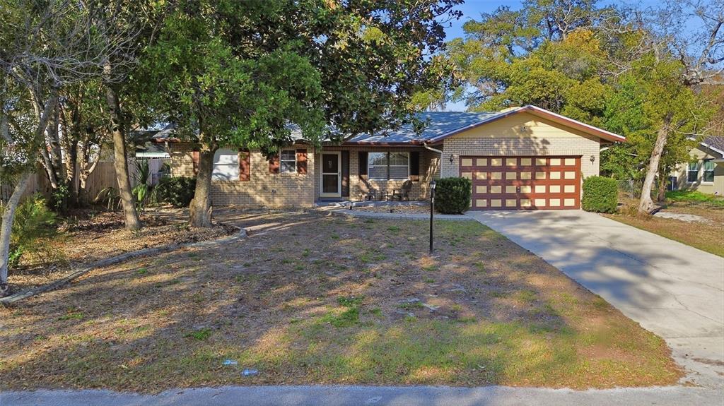 244 Angeles Road DeBary, FL 32713 - Photo 34 of 41 a front view of a house with yard
