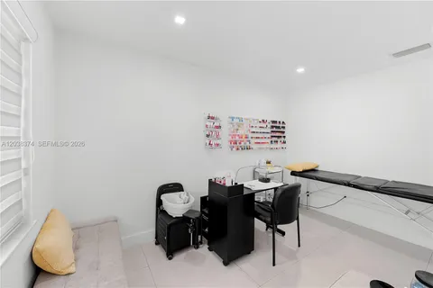 a view of a workspace with furniture